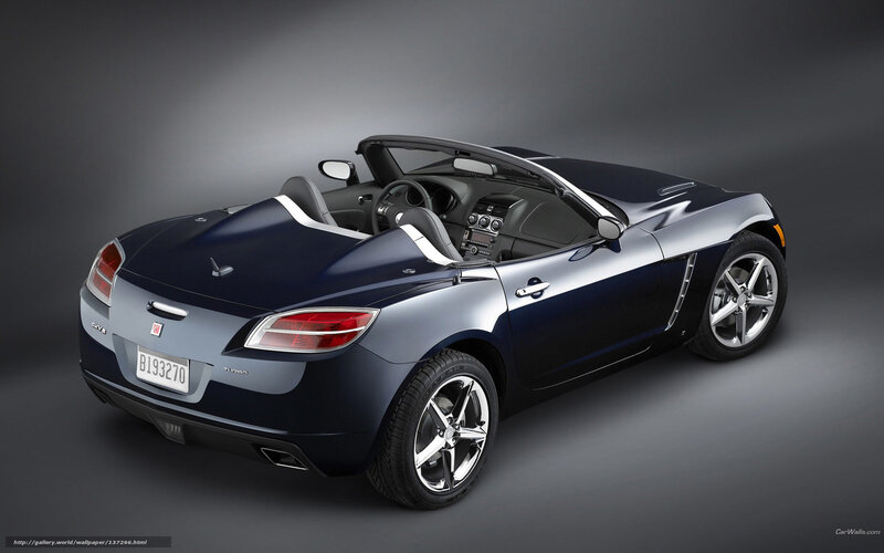 dark blue convertible sports car