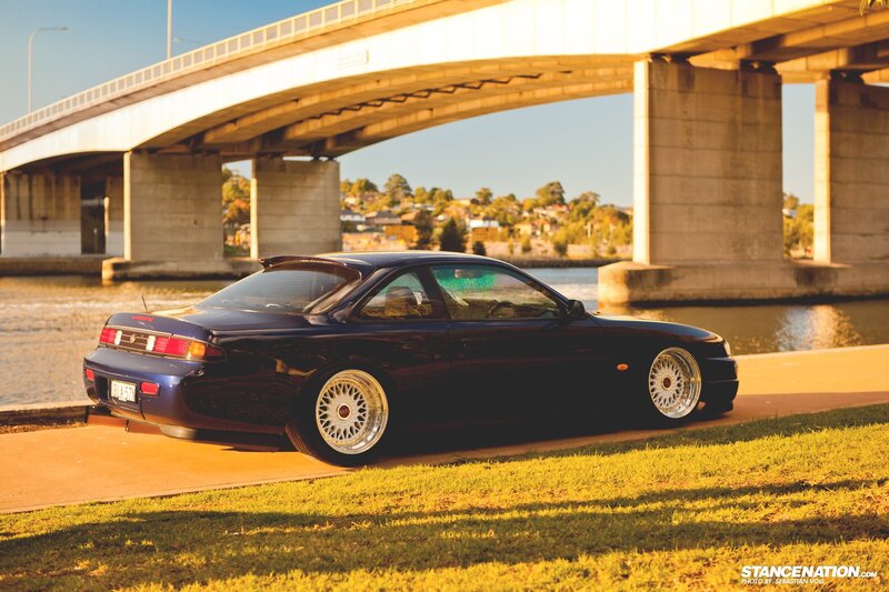 Dark Blue Coupe Car — Serene, Sunset, Photograph, Bridge