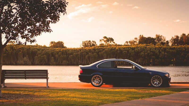 Dark Blue Coupe Car — Serene, Sunset, Photograph