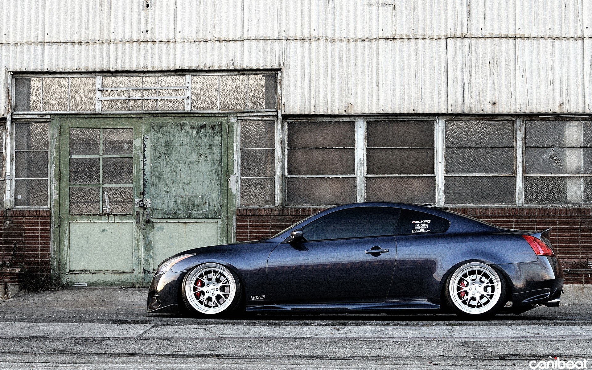 dark blue coupe car