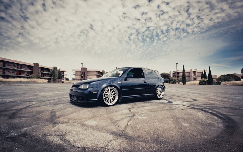 dark blue hatchback car