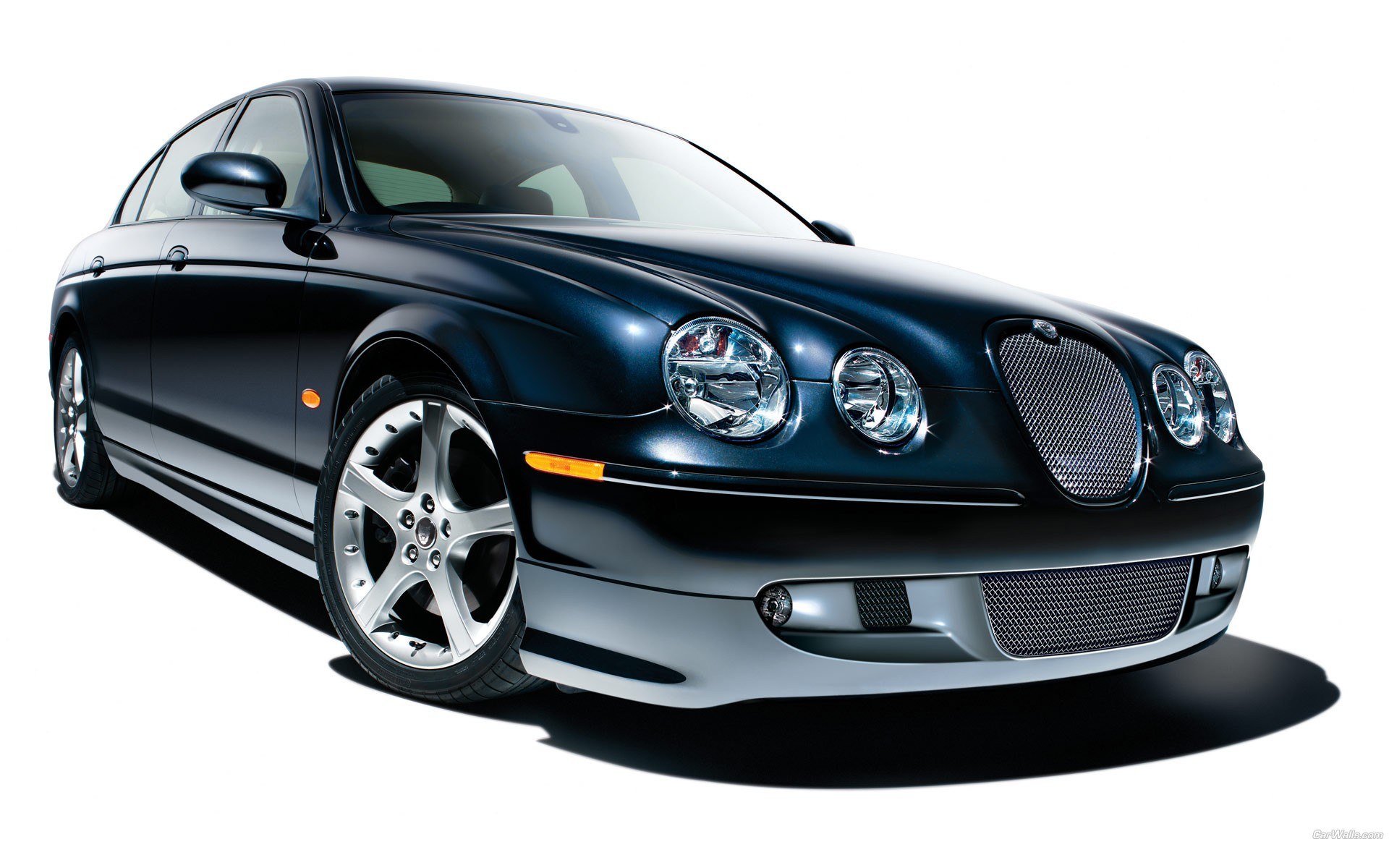 dark blue jaguar sedan