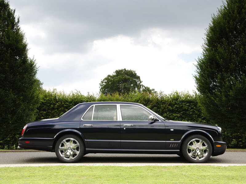 Dark Blue Luxury Sedan — Serene