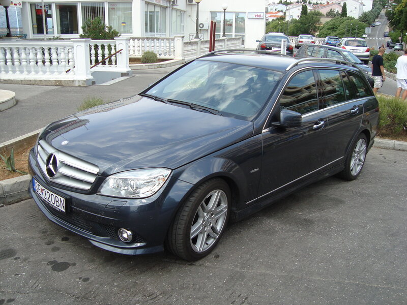 Dark blue Mercedes-Benz station wagon