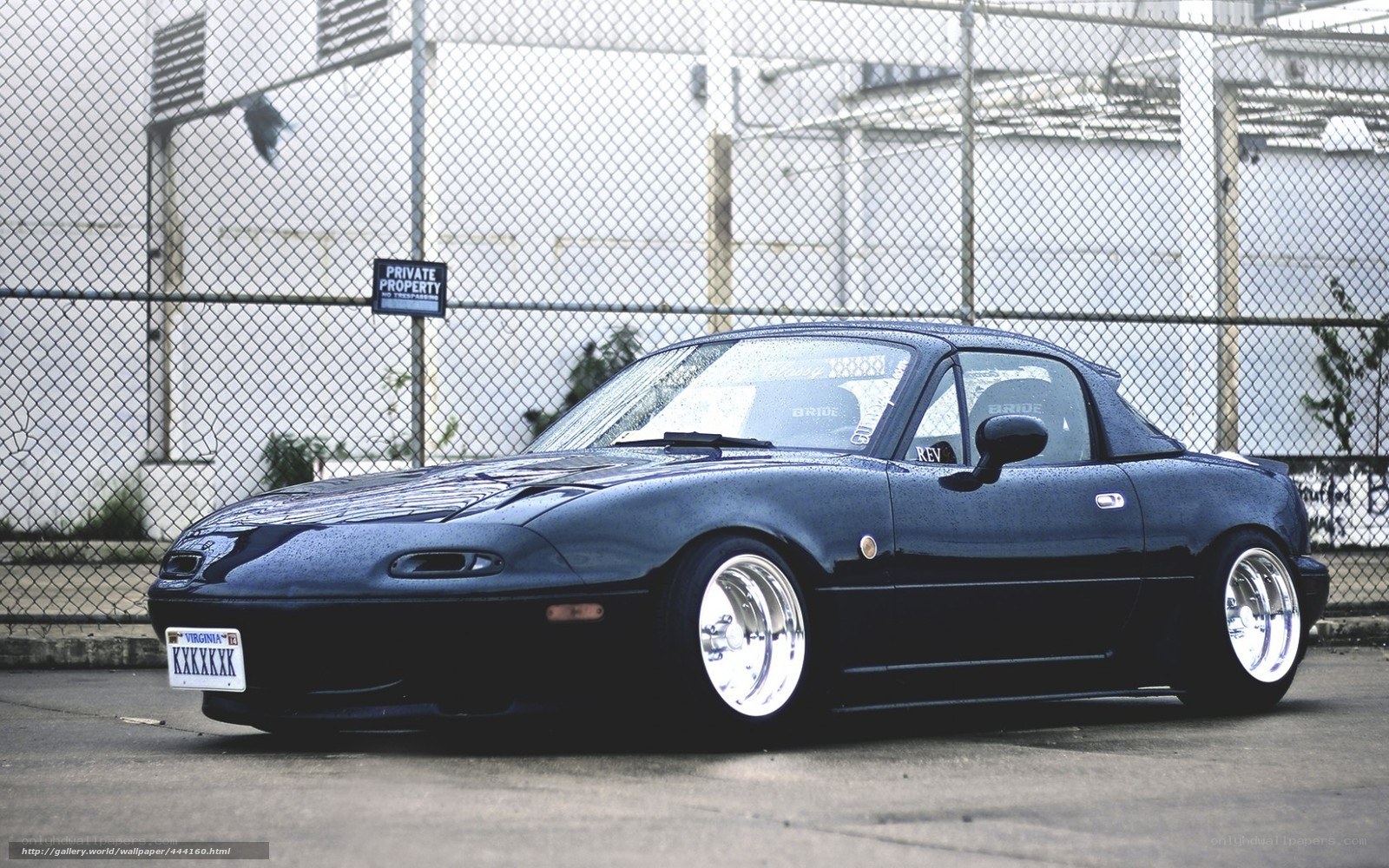 Dark blue Miata sports car