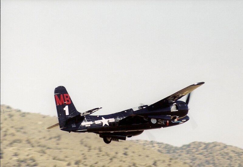 Dark Blue Propeller Plane — Neutral