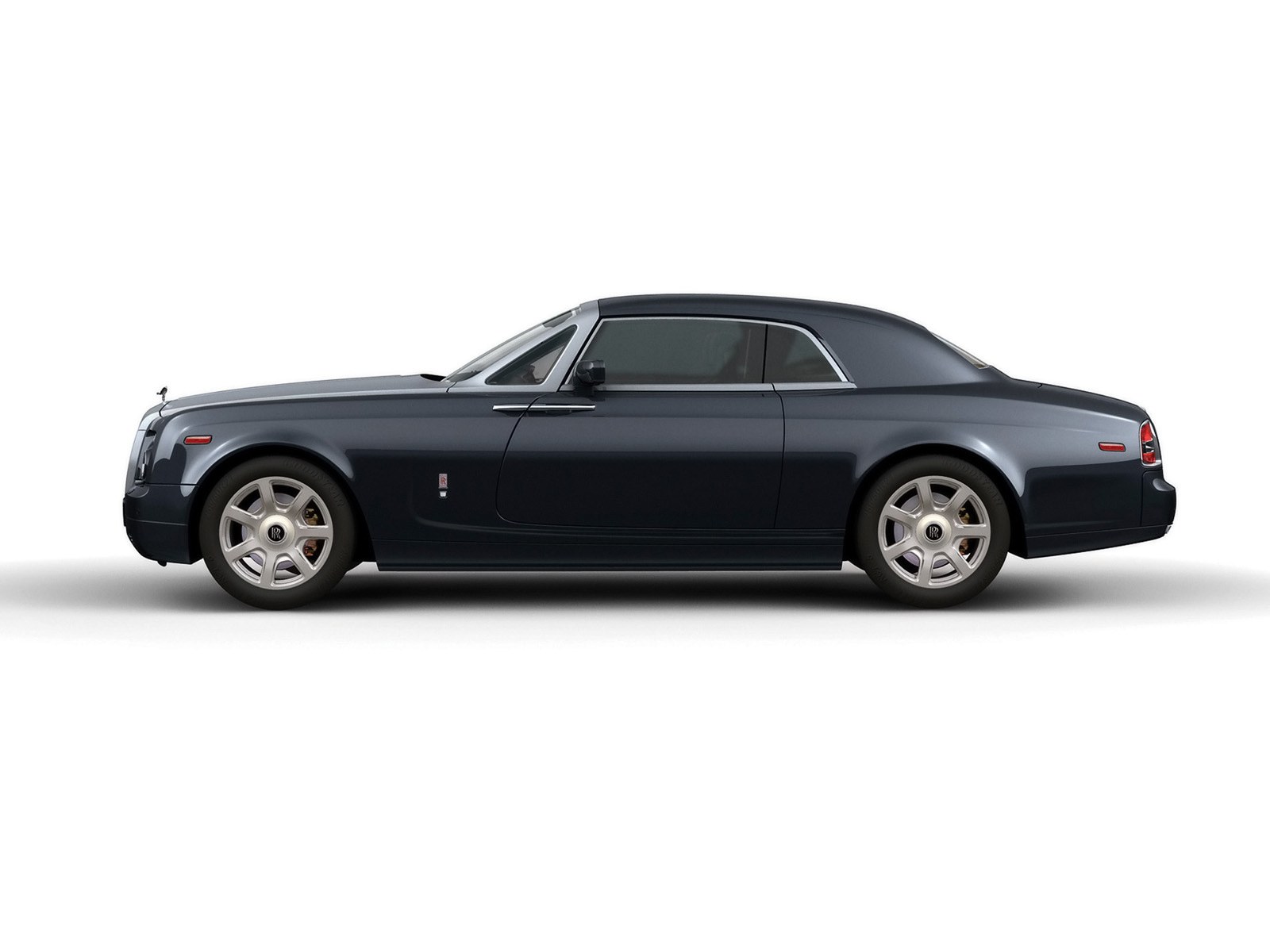 dark blue rolls-royce convertible