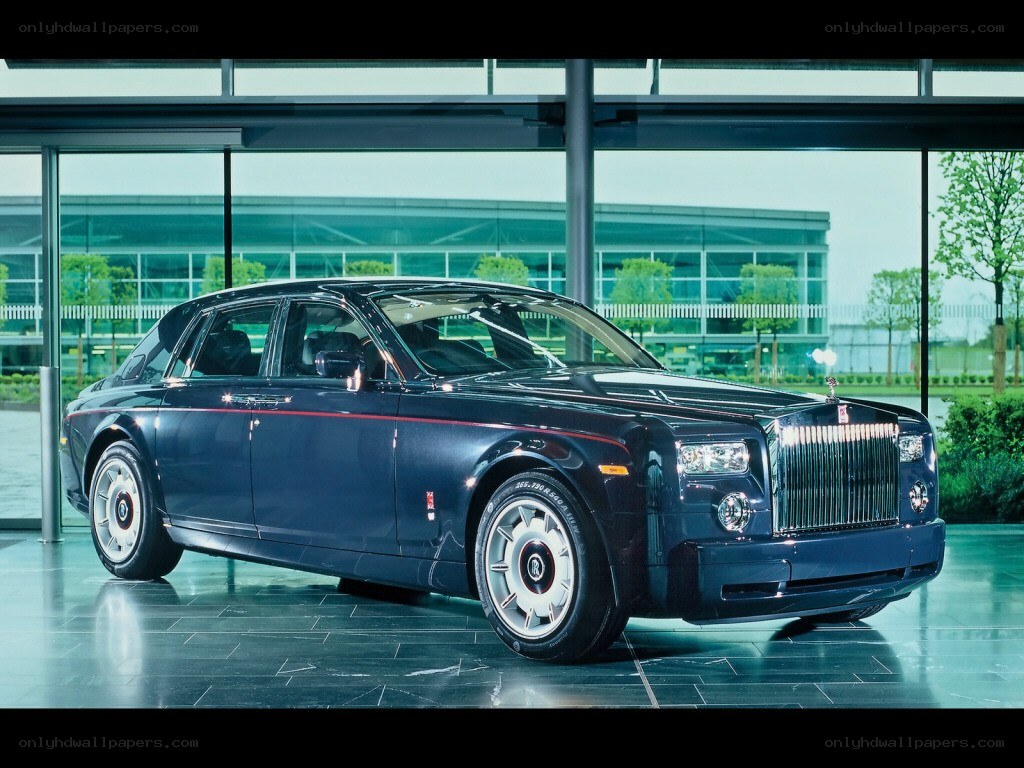 Dark blue Rolls-Royce in showroom