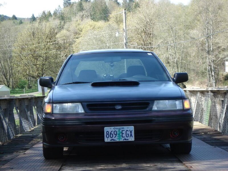 Dark Blue Sedan Car — Calm