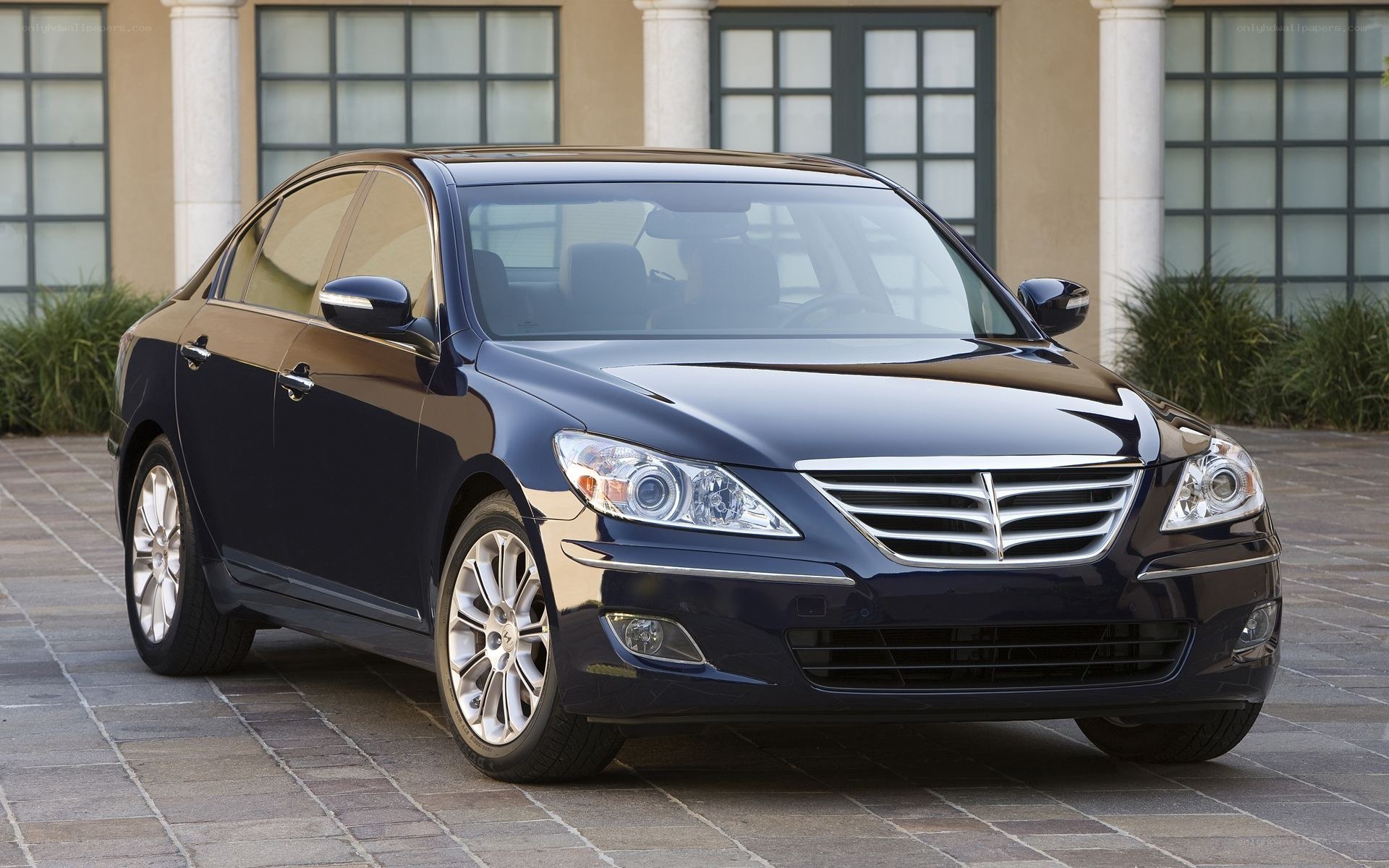 dark blue sedan parked outside