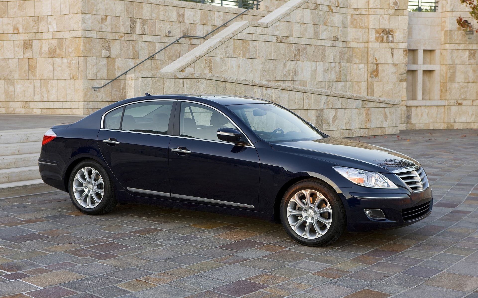 dark blue sedan parked outside