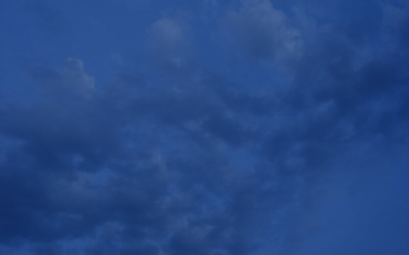 dark blue sky with clouds