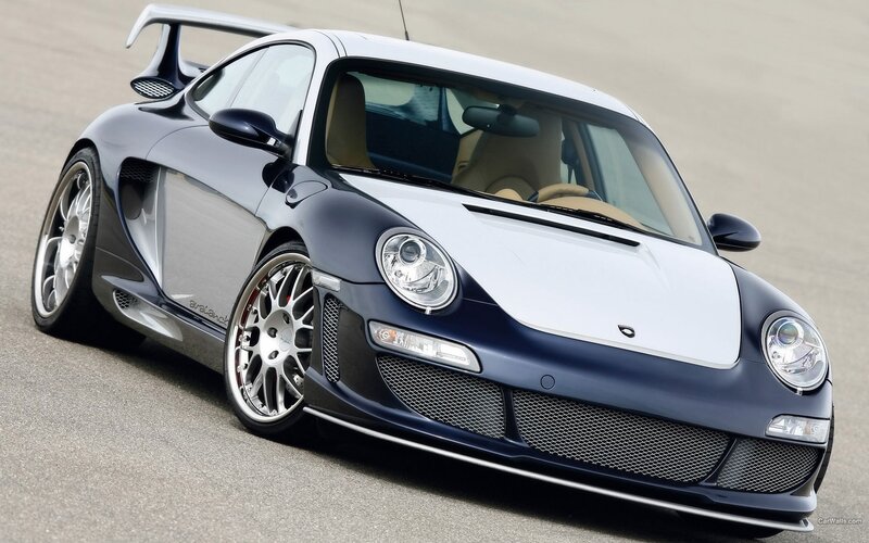 dark blue sports car on track