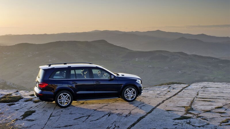 Dark Blue SUV — Serene, Sunset