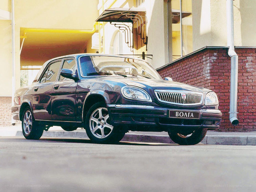 Dark blue Volga sedan parked