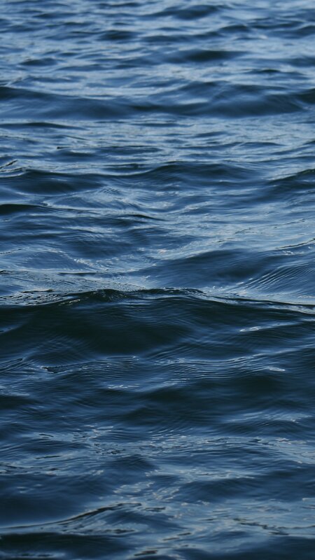 Dark Blue Water Surface — Calm