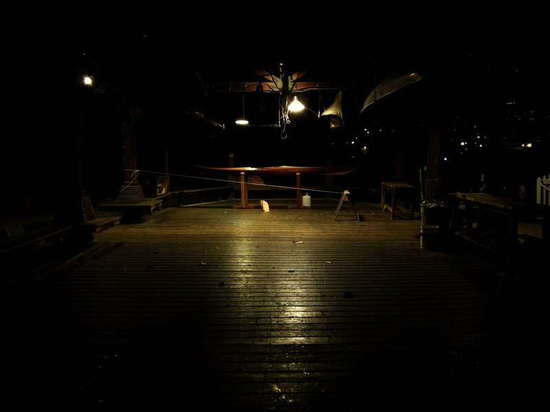 Dark boatyard at night