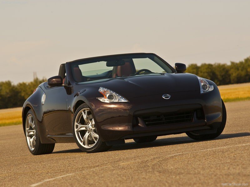 dark brown sports car on track