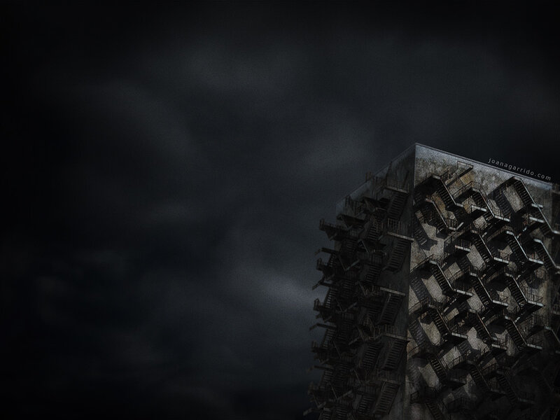 Dark building with fire escapes