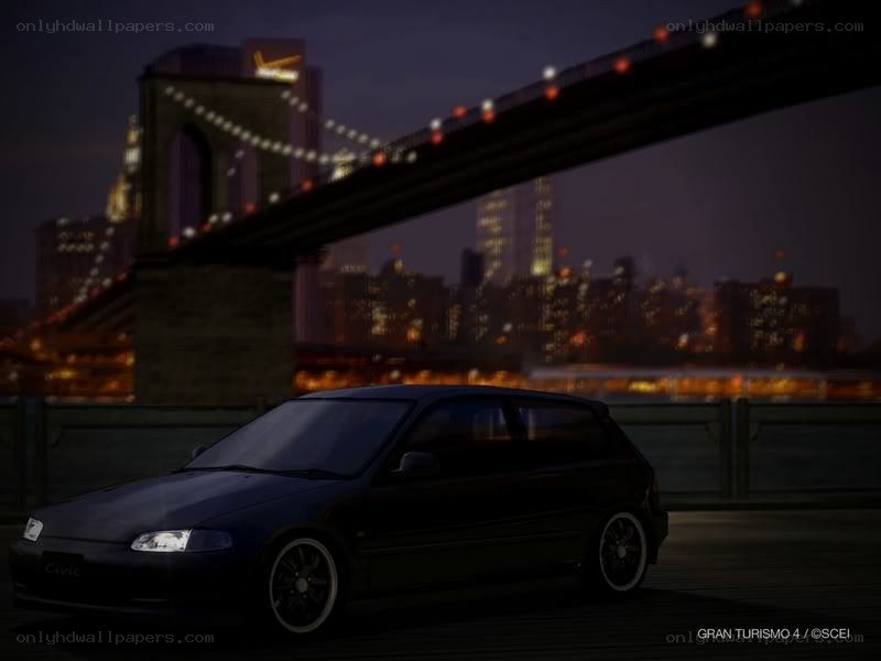 Dark car on bridge at night