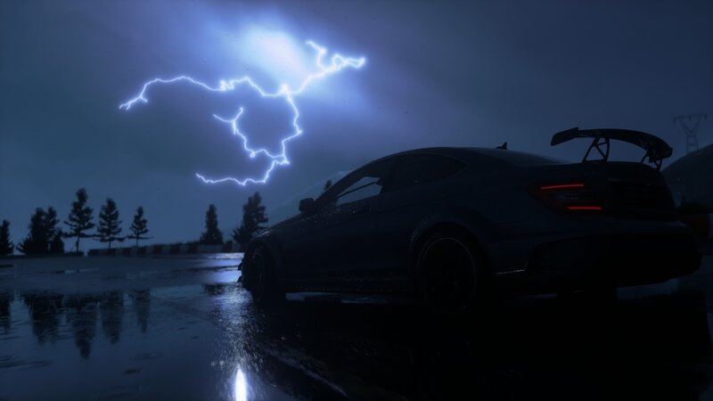 Dark Car on Wet Road