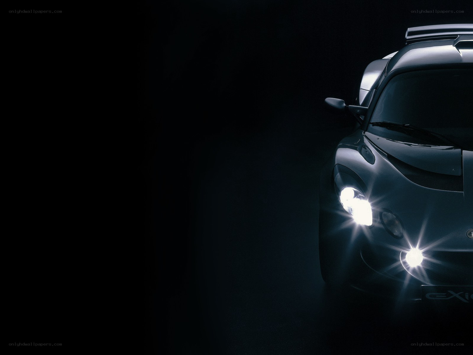 dark car with headlights on