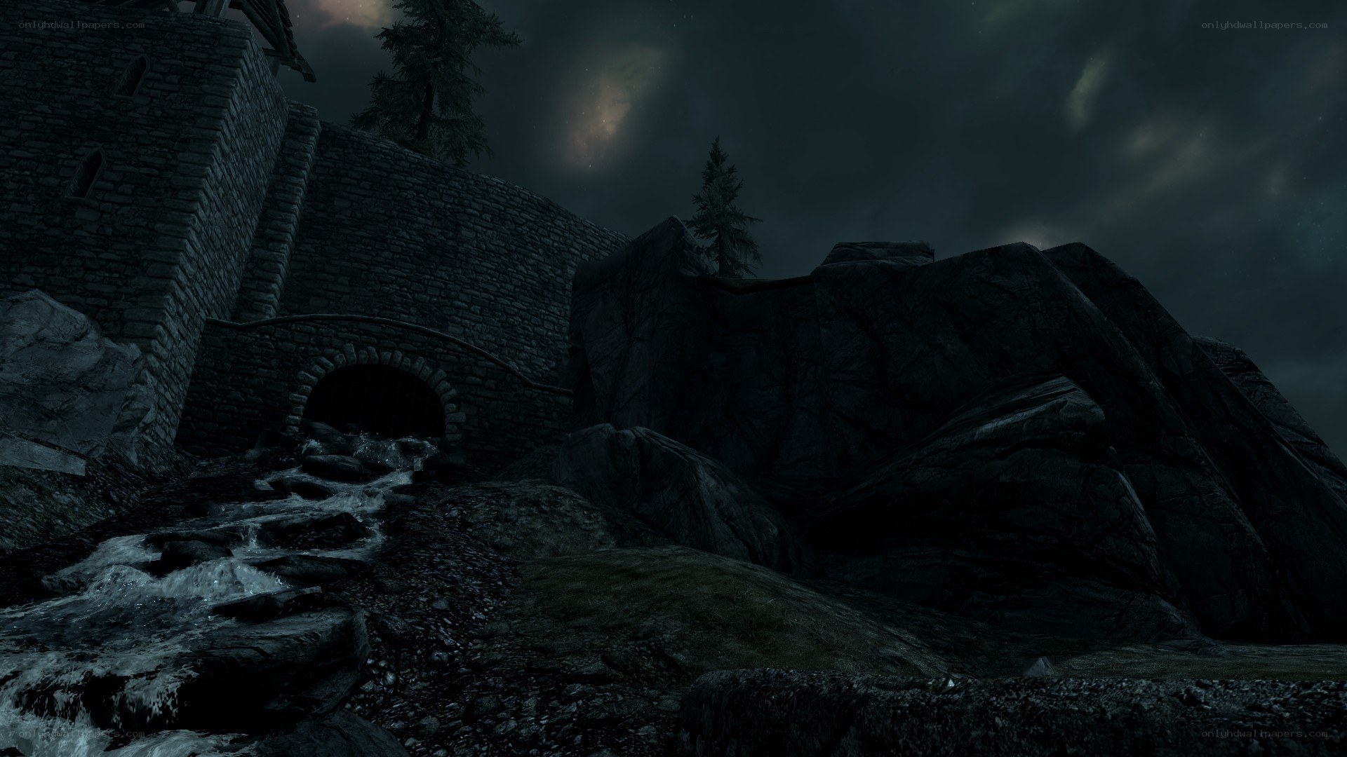 dark castle by a stream