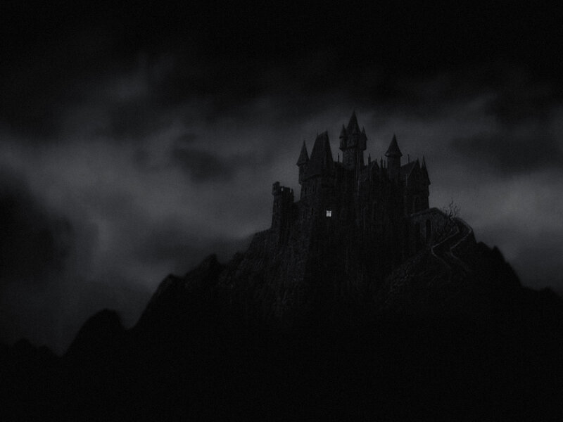 Dark castle on a mountain