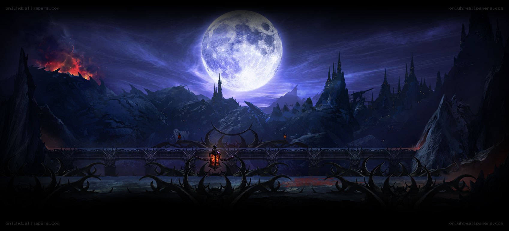 Dark castle under a full moon