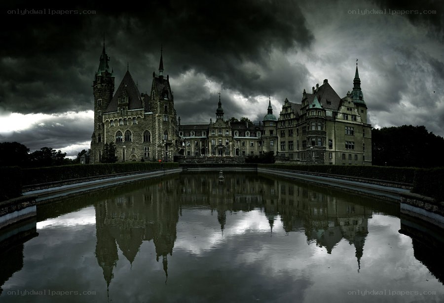 Dark castle under stormy sky