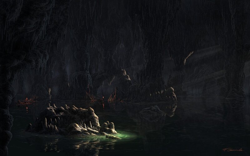 Dark cave with glowing water