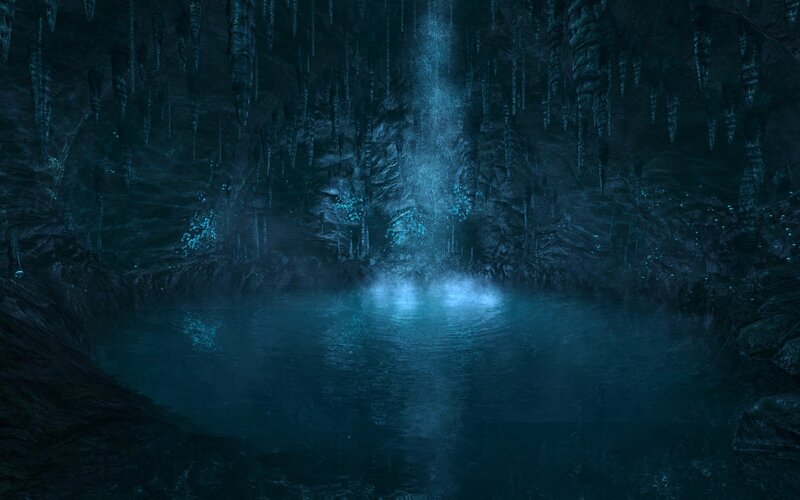 dark cave with glowing water