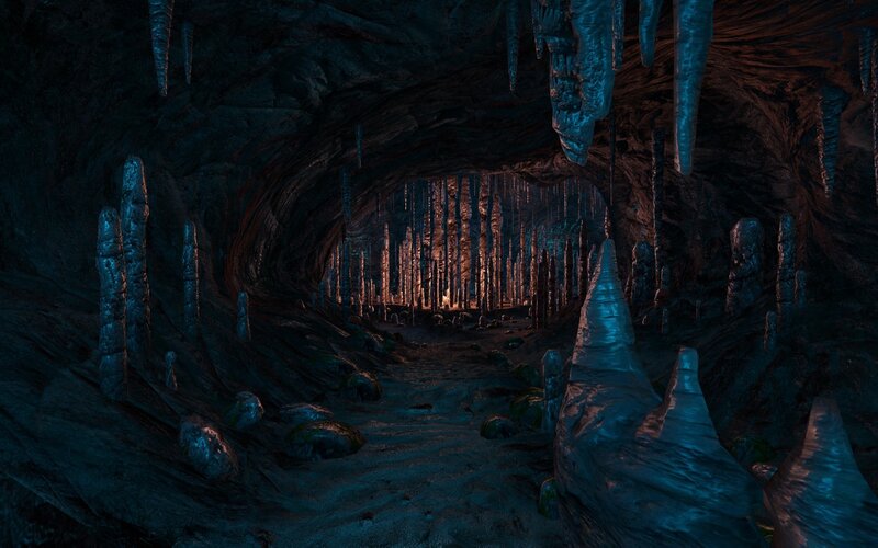 dark cave with stalactites and stalagmites