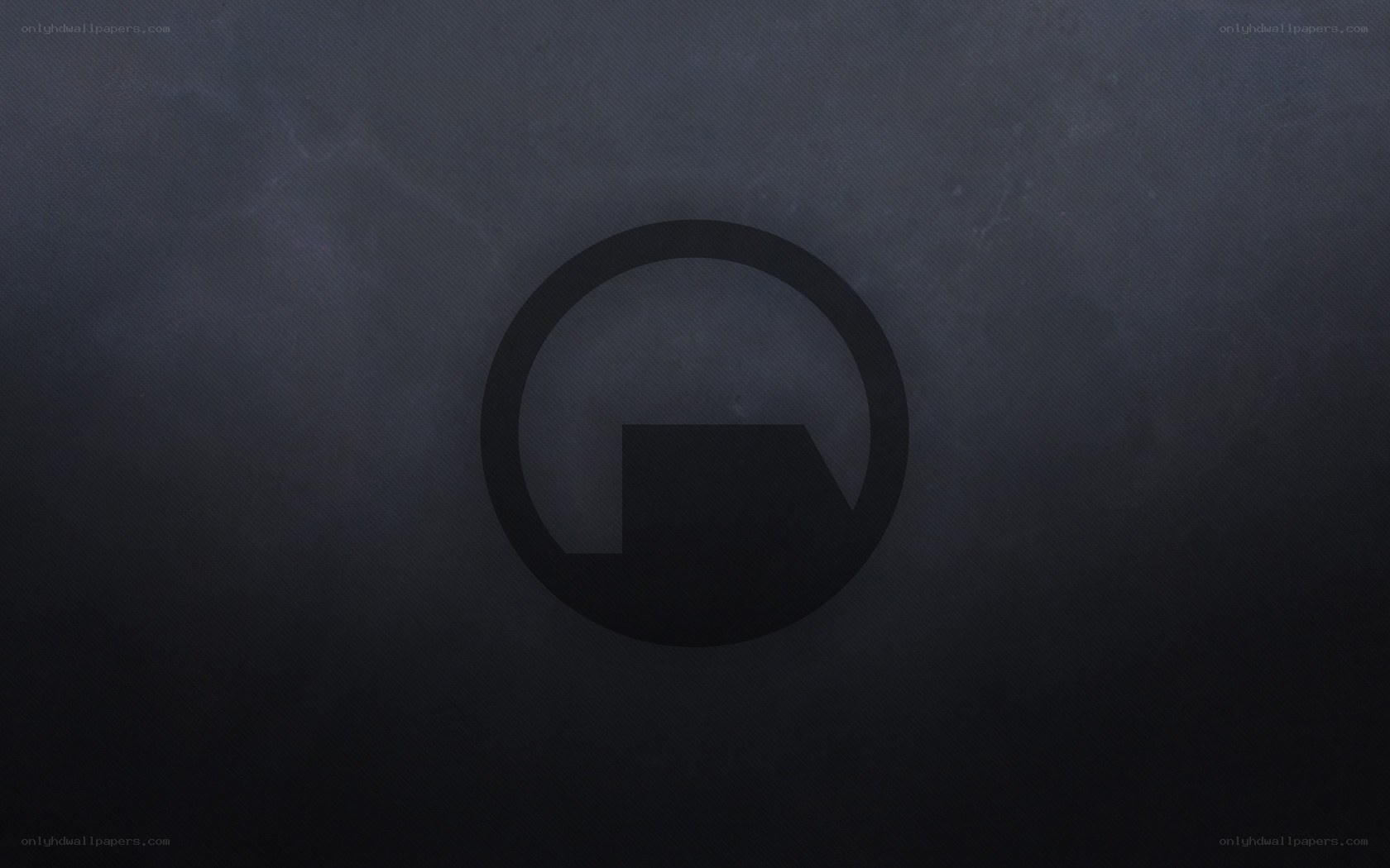 dark circular logo on textured background