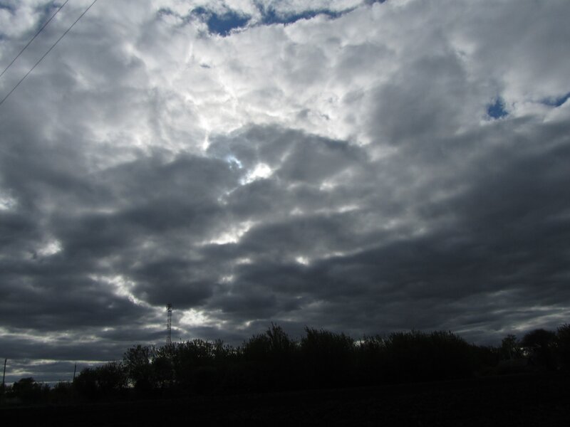 dark clouds over a field