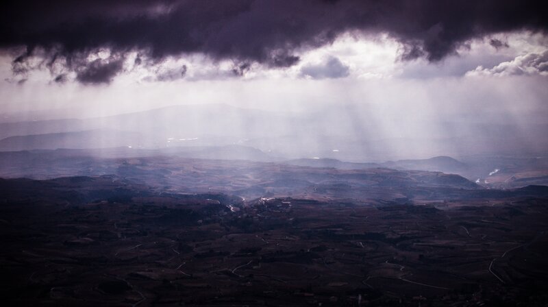 Dark Clouds over Hills