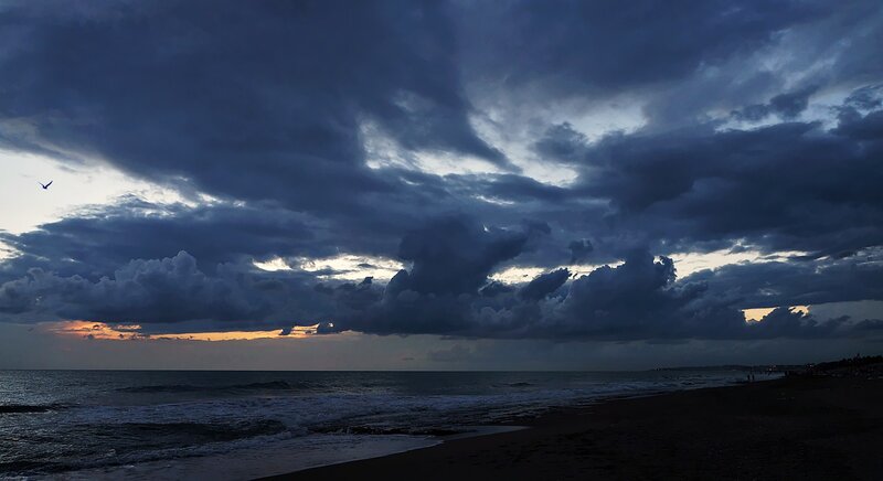 Dark Clouds over Ocean — Blue