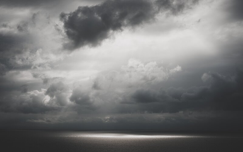 Dark Clouds over Ocean — Gray, Dramatic