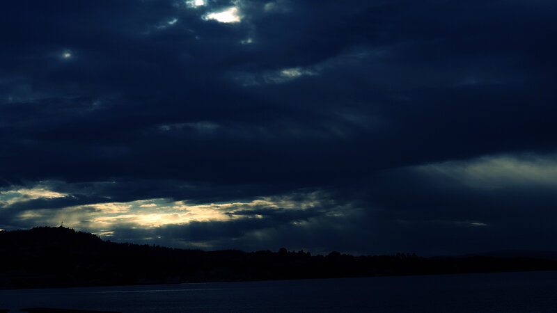 Dark Clouds over Water — Blue