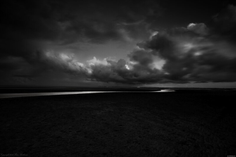 Dark clouds over wetlands
