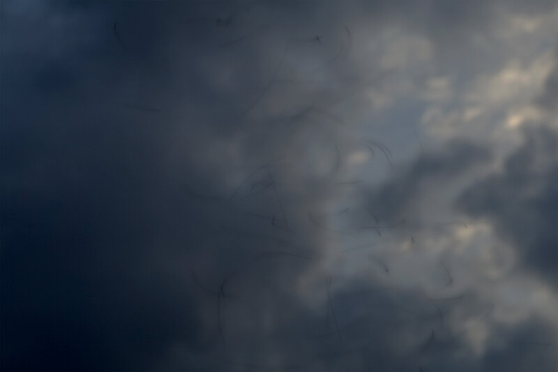 dark clouds with hair strands
