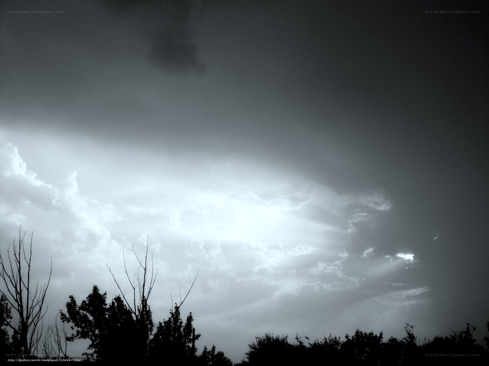 Dark clouds with sun rays