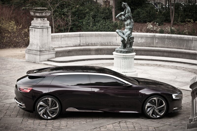 Dark concept car in garden