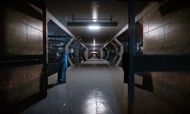dark corridor with blue device