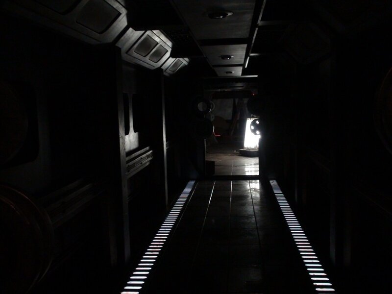 dark corridor with glowing lights
