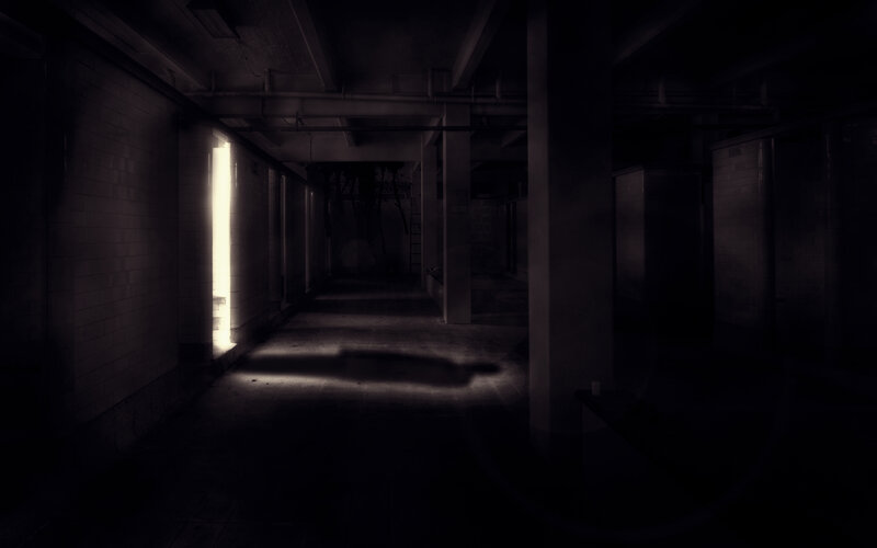 dark corridor with light beam