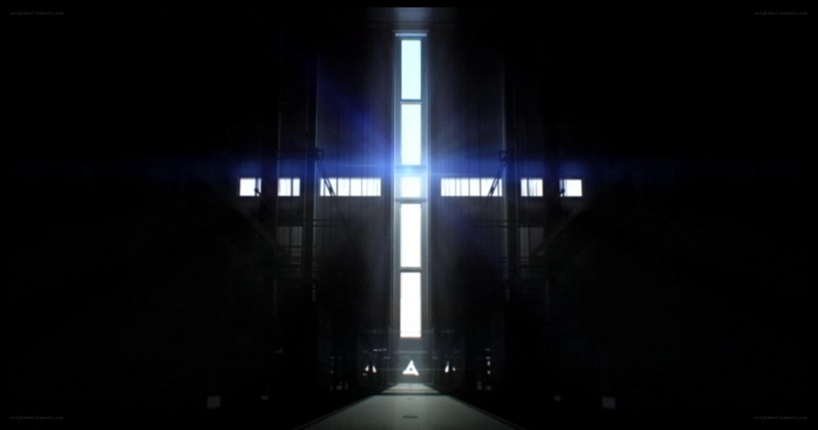 dark corridor with light cross