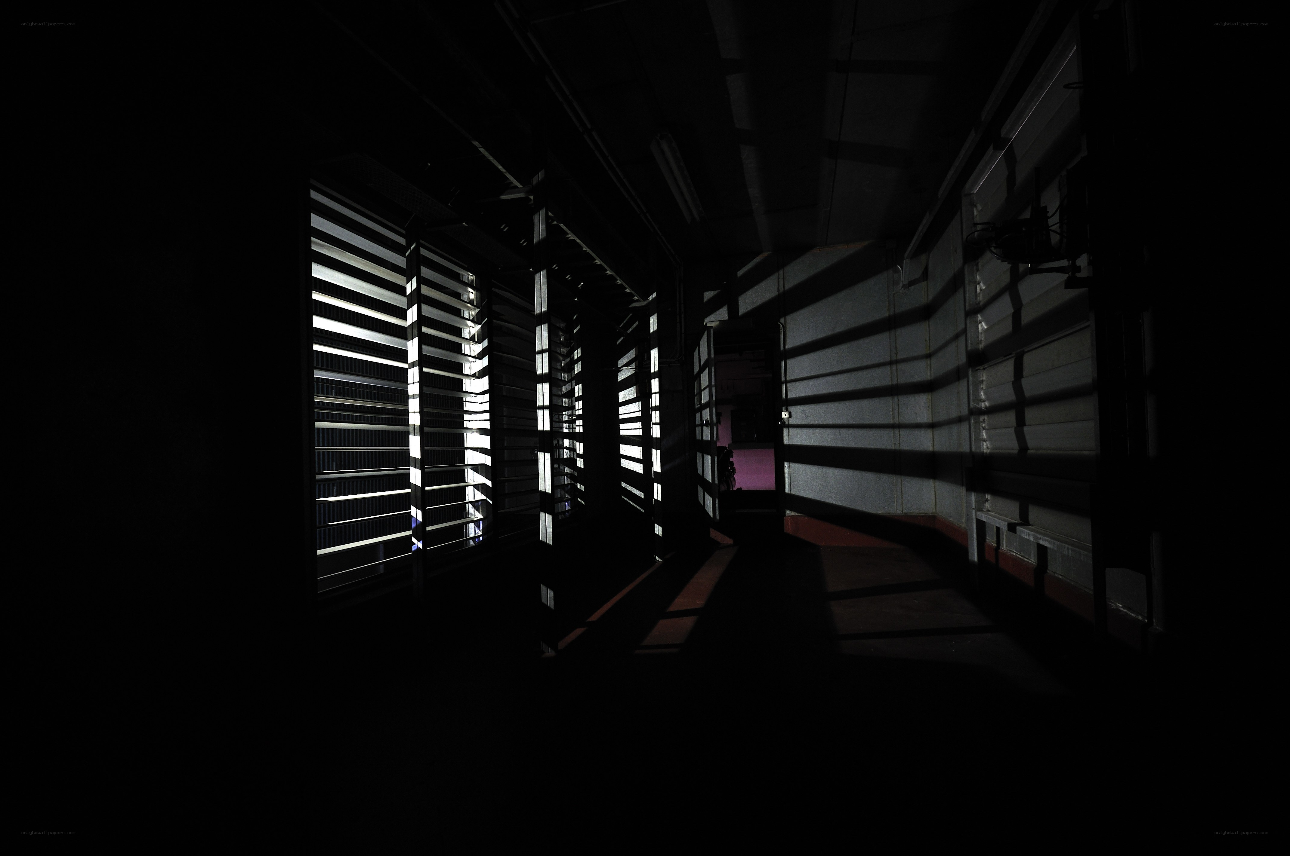 Dark corridor with light stripes