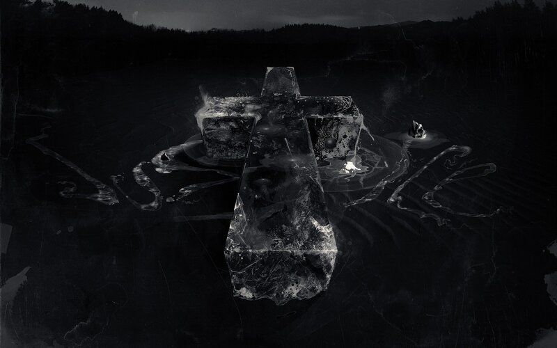 Dark cross on frozen lake