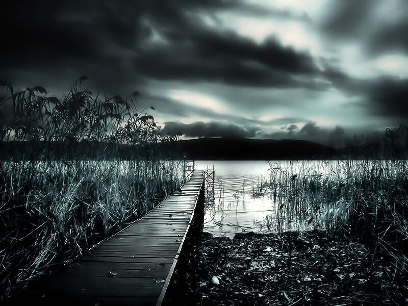 Dark dock at a lake